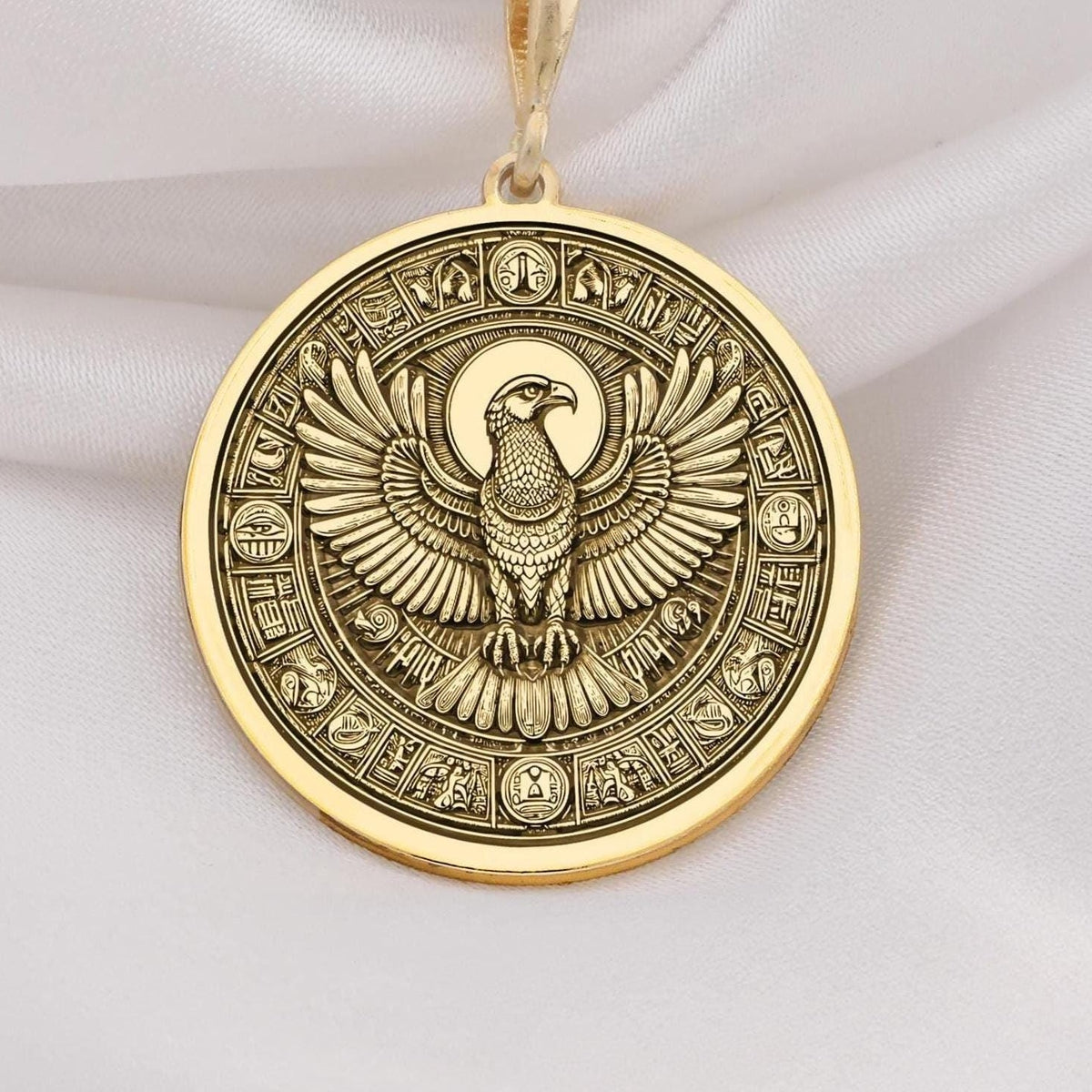 Horus Falcon Protection Pendant Necklaces 14K 14K Gold Plated pendant necklace featuring an eagle with wings design on a circular frame.