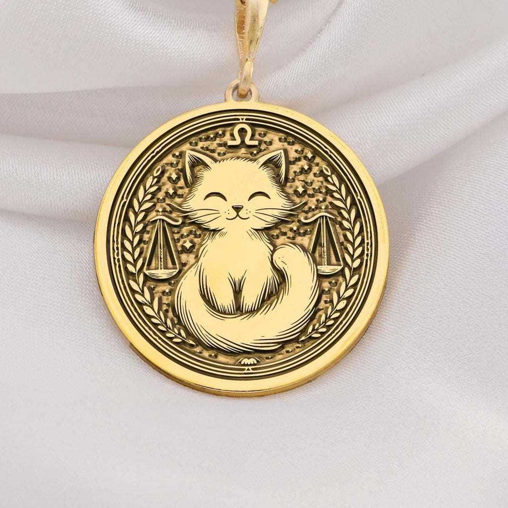 Libra Scales Zodiac Pendant Necklaces 14K 14K Gold Plated pendant necklace featuring a cat between scales design.