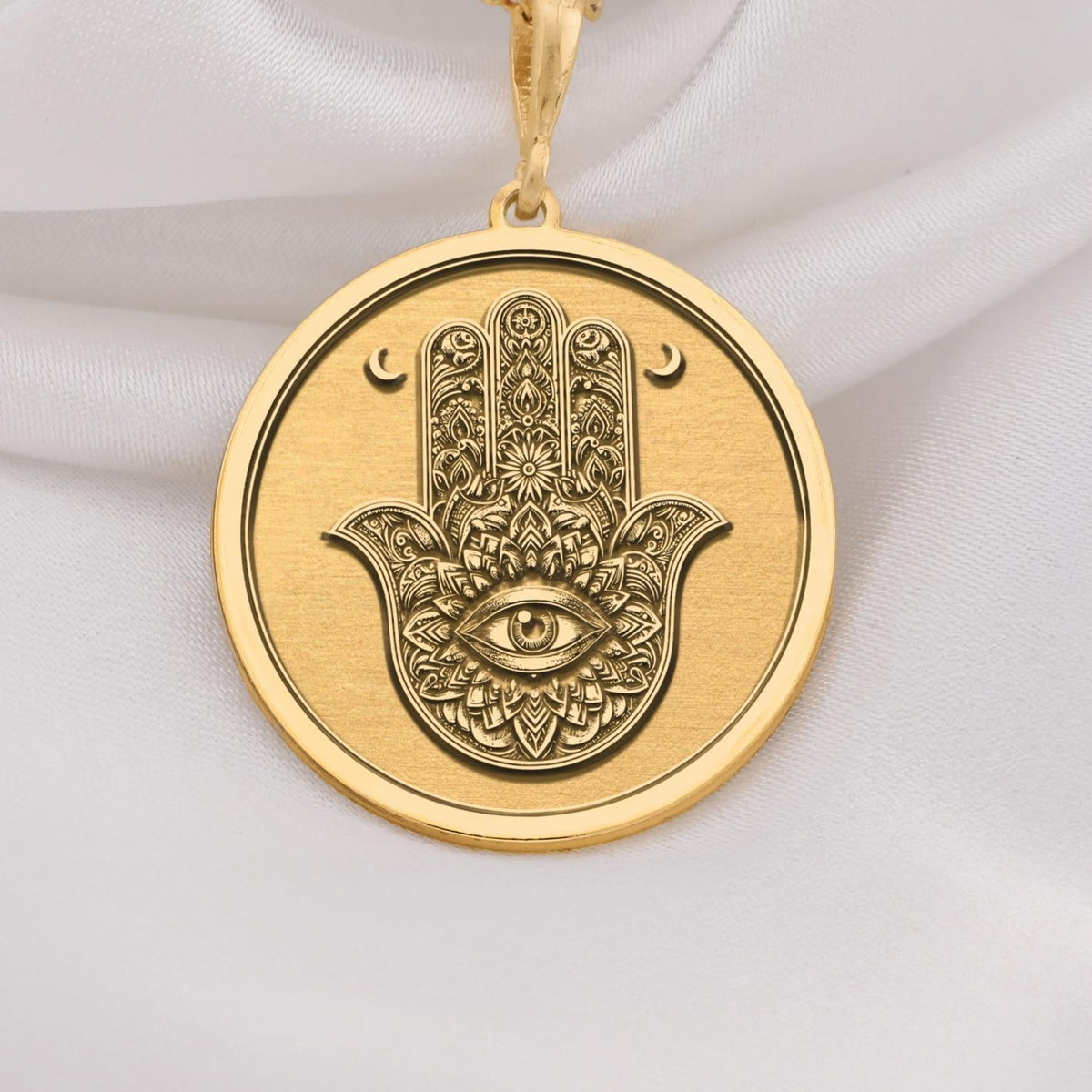 Hamsa Hand Protection Amulet Necklaces 14K 14K Gold Plated pendant necklace featuring a stylized eye motif with crescent shapes.