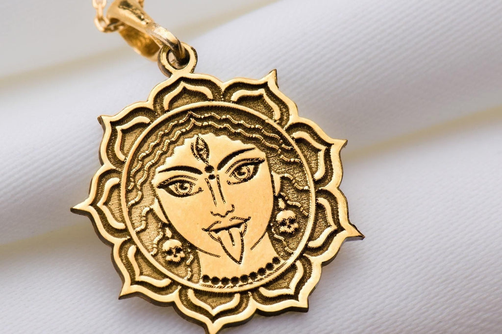 Durga Warrior Goddess Amulet Necklace Necklaces 14K 14K Gold Plated pendant necklace featuring a stylized face design within a circular mandala frame.