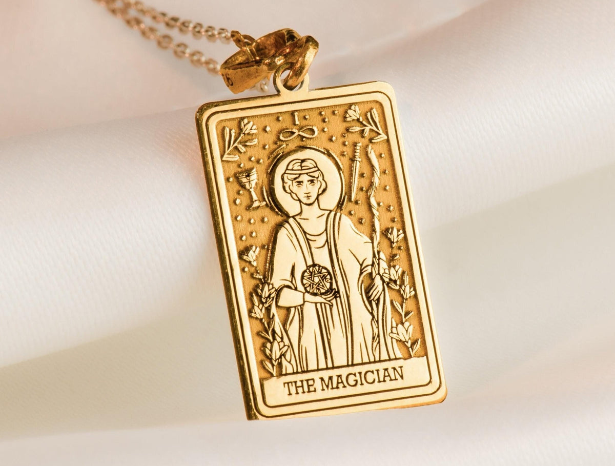 Magician Tarot Rider Waite Necklace Necklaces 14K 14K Gold Plated rectangular pendant featuring The Magician figure design on a gold-toned metal.