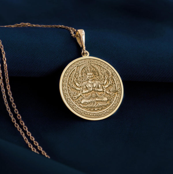 14K gold Ragaraja pendant showcasing intricate details, a symbol of spiritual enlightenment and transformation, perfect for Buddhist devotees.