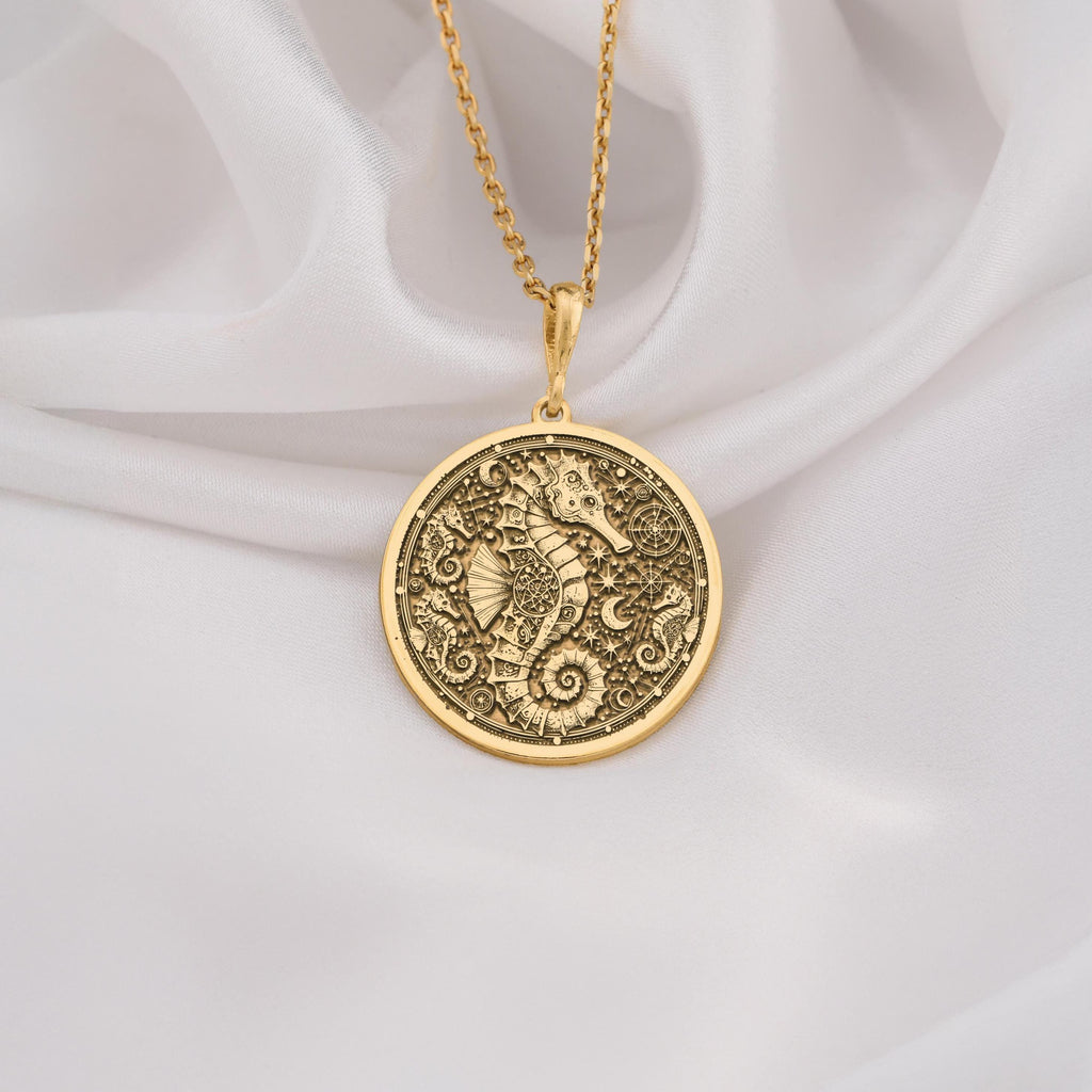 14k gold seahorse necklace featuring a detailed nautical design, perfect for ocean lovers and beach themed occasions, made with high quality solid gold.
