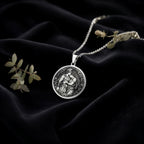 Achilles & Patroclus Greek Mythology Pendant Pendants 925 925 Sterling Silver round pendant with engraved classical figures on a chain.