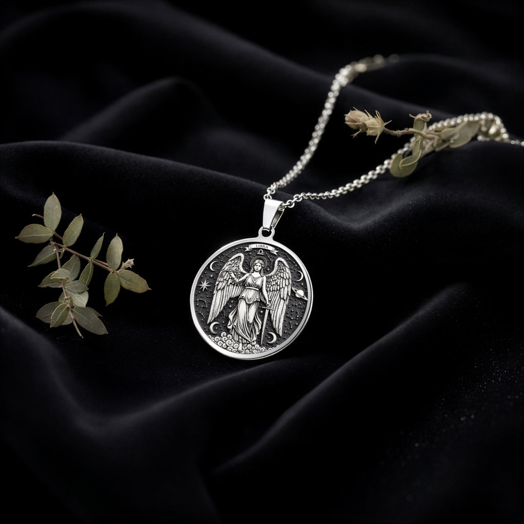 Libra Zodiac Guardian Angel Wings Necklace Necklaces 925 925 Sterling Silver winged angel pendant necklace on black fabric