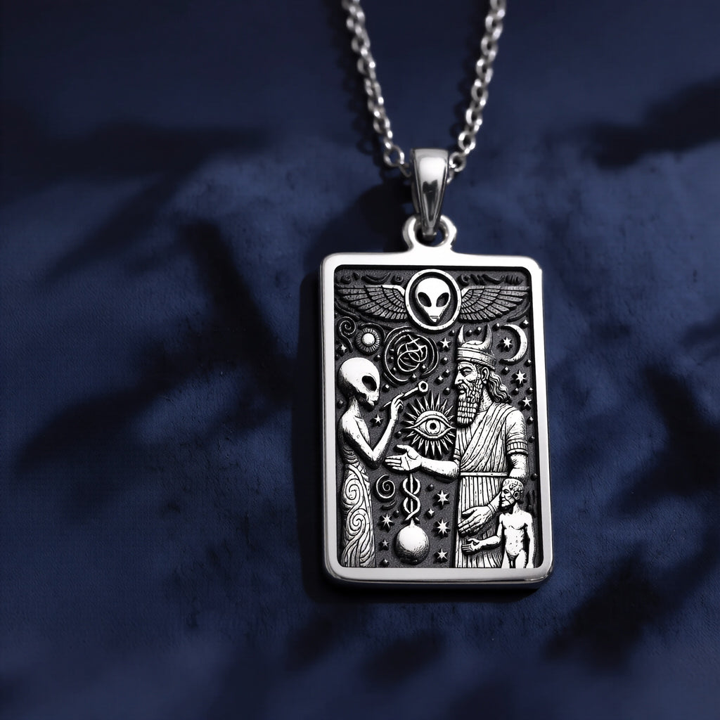 Silver rectangular pendant with detailed engraved artwork featuring ancient style figures and an alien design. This piece is displayed with a silver chain on a dark surface.