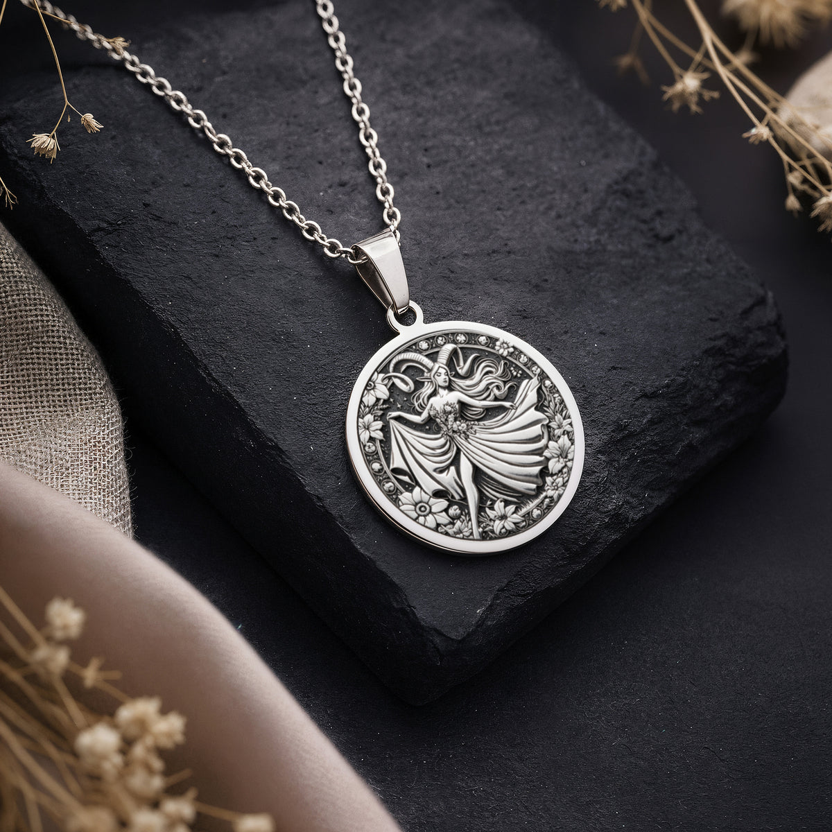 Aries Zodiac Astrological Sign Necklace Pendants 925 925 Sterling Silver winged figure pendant necklace on dark stone background
