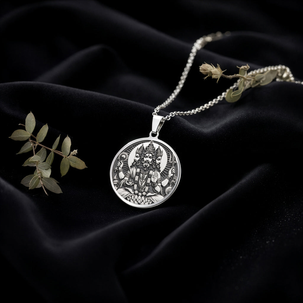 Brahma Creator God Pendant Pendants 925 925 Sterling Silver sterling silver pendant with intricate face design on a chain.