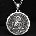 Meditating Buddha Mindfulness Pendant Necklaces Silver pendant of a meditating Buddha with tree motifs on a chain necklace