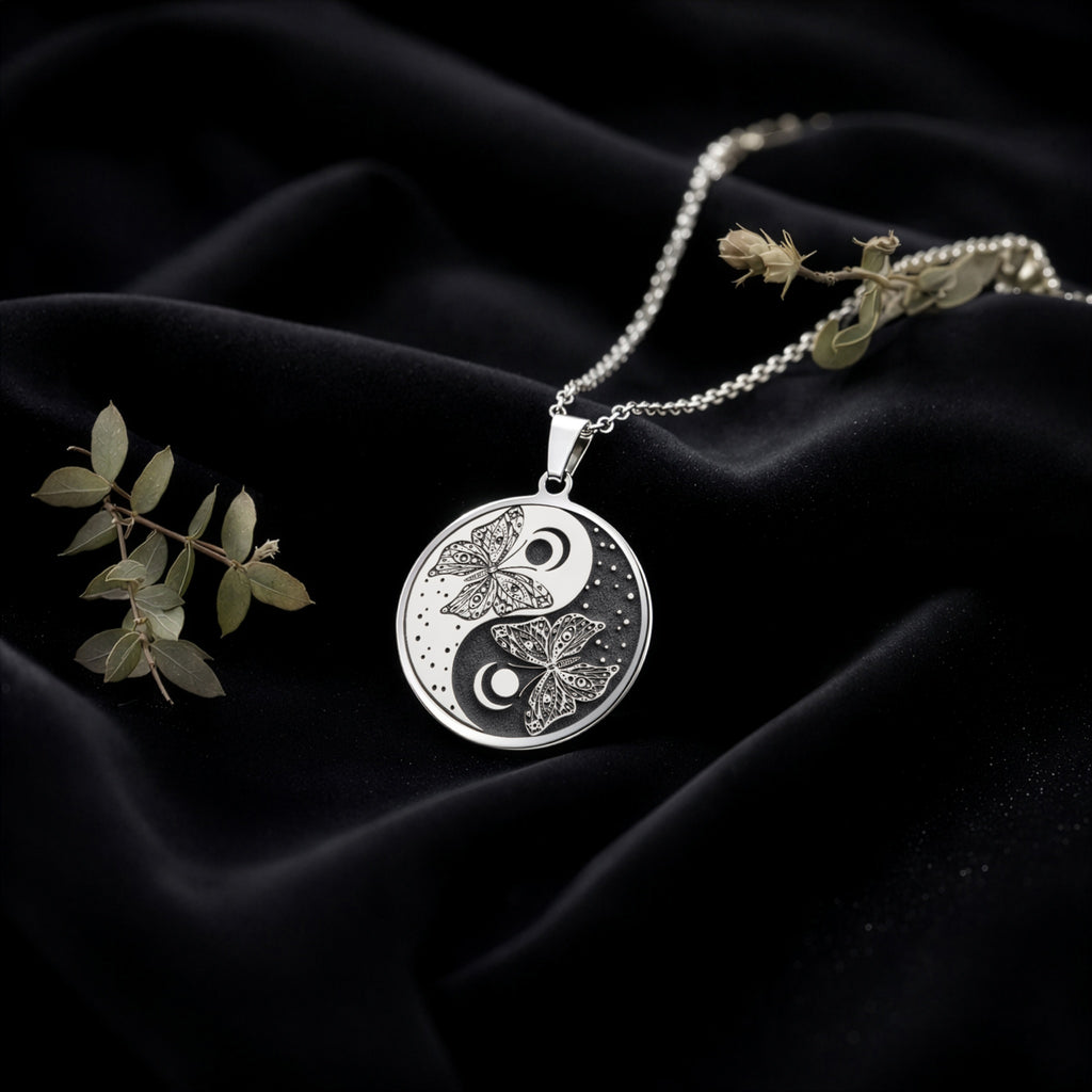 Butterfly Yin Yang Celestial Pendant Pendants 925 925 Sterling Silver metal pendant with interlocking floral motifs on a round shape.