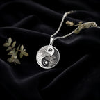 Butterfly Yin Yang Celestial Pendant Pendants 925 925 Sterling Silver metal pendant with interlocking floral motifs on a round shape.