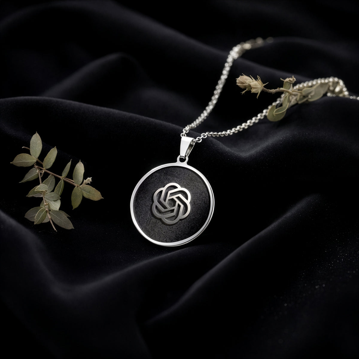 ChatGPT AI Talisman Amulet Necklace Necklaces Gunmetal pendant necklace with an intertwined knot design on a black background.