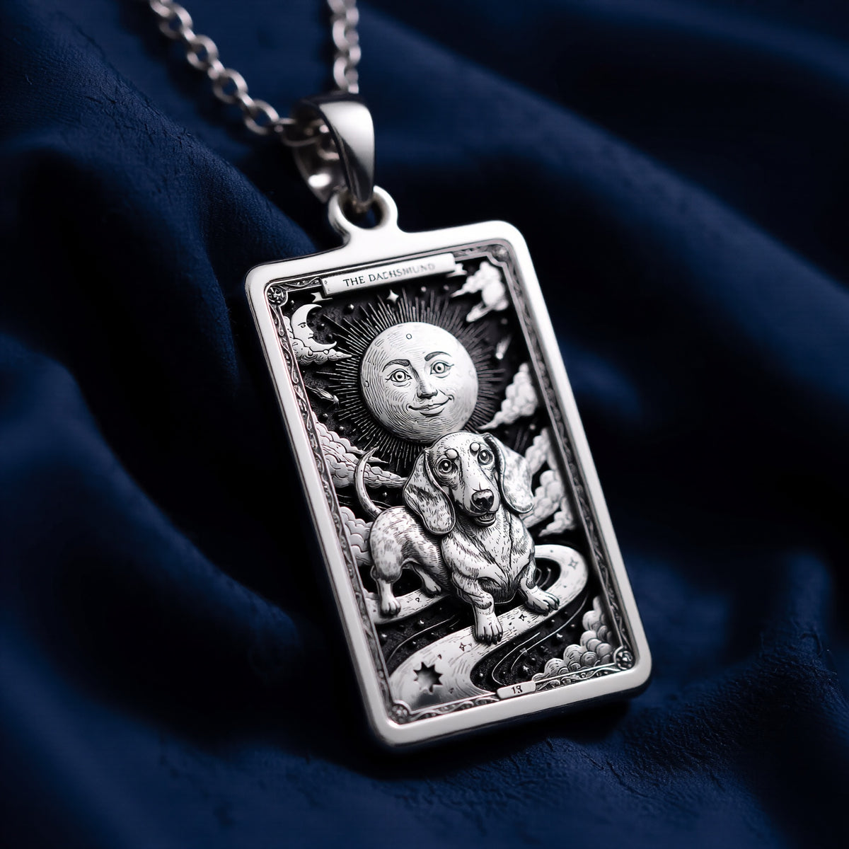 An heirloom-quality 14K solid gold Dachshund tarot pendant. The art shows the dog in a "Sun" card, symbolizing a sunny personality, a precious dog mom gift.