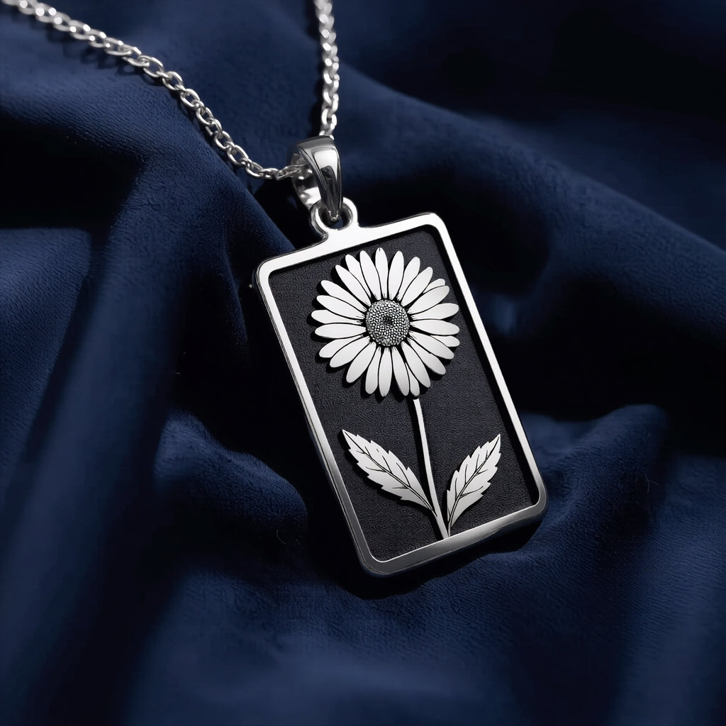Silver floral pendant necklace with a daisy design, shown on a size chart and chain length guide for jewelry sizing.