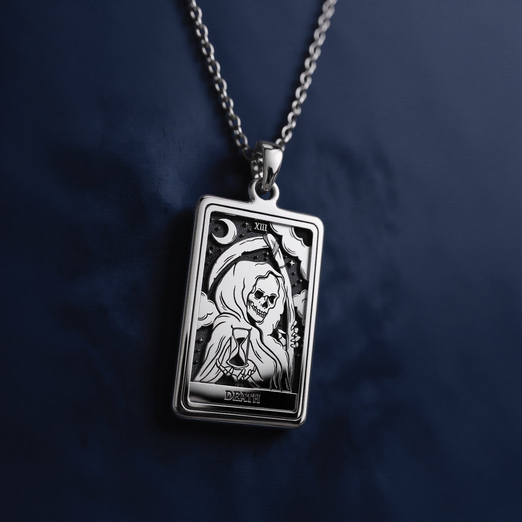 Rectangular 925 sterling silver pendant necklace featuring an engraved Death tarot card design with skeletal figure, hourglass, crescent moon, Roman numeral XIII, and “DEATH” inscription at bottom.