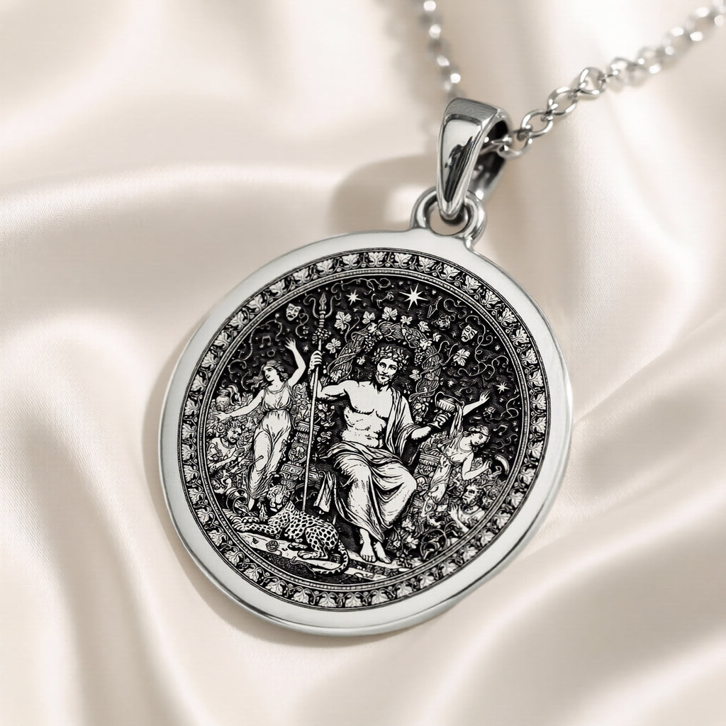 Silver circular pendant featuring a detailed classical scene with figures, presented in a silver tone. The pendant hangs from a silver chain and is viewed from the front.