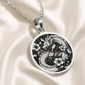 Silver pendant featuring an intricate Japanese dragon motif with detailed scales and flowing lines. The pendant has a polished surface finish and is suspended from a delicate silver chain