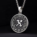 925 Sterling Silver Sagittarius Zodiac Medallion featuring the archer symbol inside a laurel wreath. This celestial coin pendant is engravable, a premium personalized astrology gift.