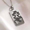 The Fool Tarot Pendant necklace in silver tone. Detailed Major Arcana occult symbol spiritual jewelry.
