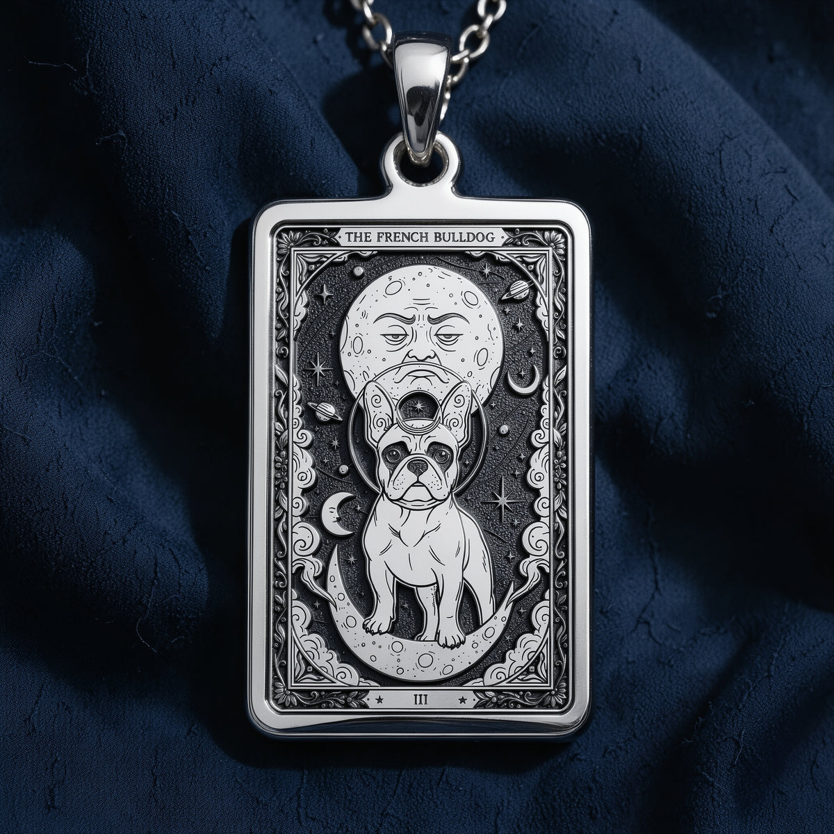 An heirloom-quality 14K solid gold French Bulldog tarot pendant. The art shows the Frenchie under a moon-face, symbolizing its comical spirit, a precious dog mom gift.