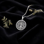 Archangel Gabriel Trumpet Medallion Necklace Pendants 925 925 Sterling Silver round pendant with winged angels design on a chain.
