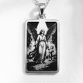 Silver rectangular pendant necklace featuring an engraved depiction of a winged figure holding a child. The piece is attached to a silver chain and displayed against a dark background.