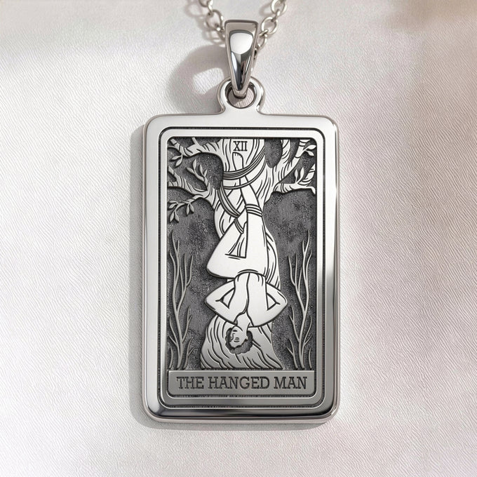 Hanged Man spiritual talisman pendant necklace. Silver and gold plated options for gothic occult jewelry and spiritual protection.