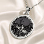 Huckleberry Finn Raft Scene Pendant Necklaces 925 925 Sterling Silver round pendant featuring a detailed maritime scene of a figure in a boat.