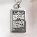 Front view of Judgement Tarot necklace pendant in white sterling silver, rectangular engraved design with angel blowing a trumpet and rising hands.