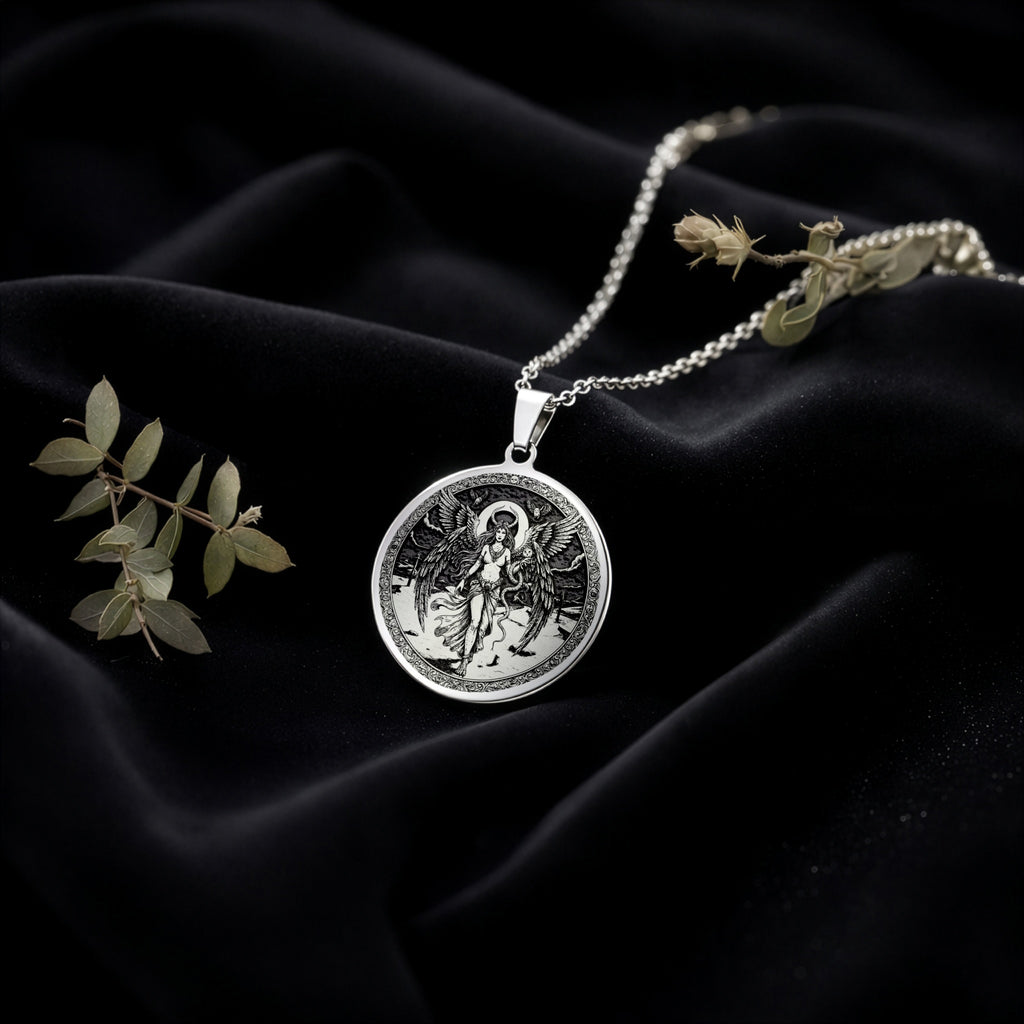 Lilith Rebel Goddess Coin Pendant Necklaces 925 925 Sterling Silver round pendant with winged figure design on a chain.