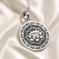 Silver pendant featuring an intricate lotus mandala design with detailed circular patterns. The pendant has a polished surface finish and is suspended from a delicate silver chain