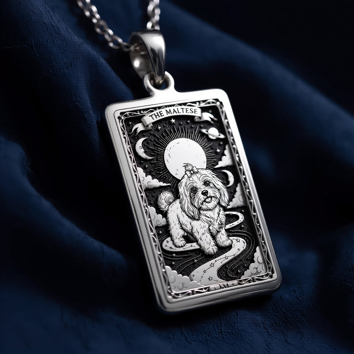 A striking 925 sterling silver Maltese charm. The art shows the celestial dog, a meaningful piece of jewelry for a pet owner.