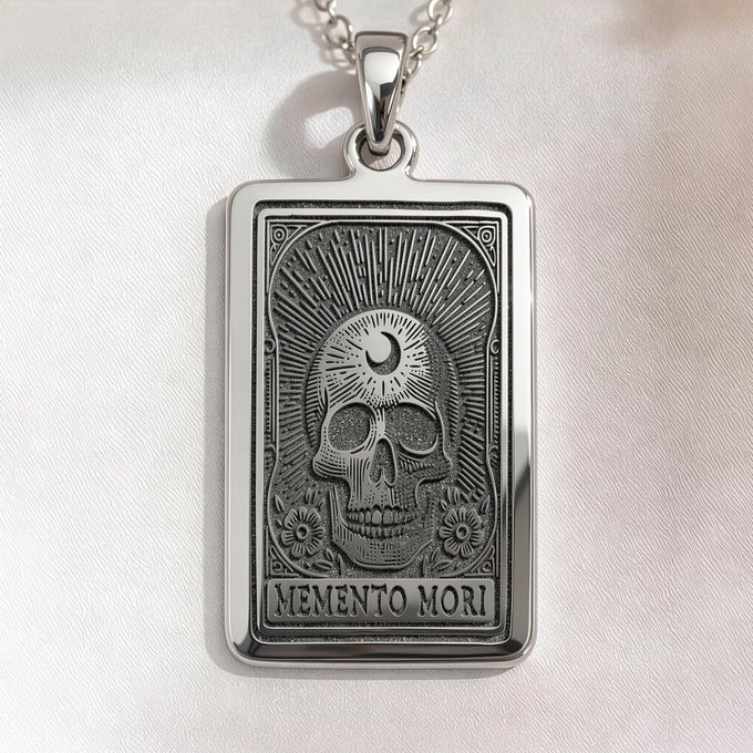 Memento Mori skull necklace pendant. Silver or gold plated gothic memento mori amulet jewelry with a shiny finish.