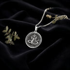 Sterling silver Naga Serpent Talisman Necklace: round  Naga serpent with raised hood an...