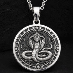 Sterling silver Naga Serpent Talisman Necklace: round  of Naga serpent with detailed sc...