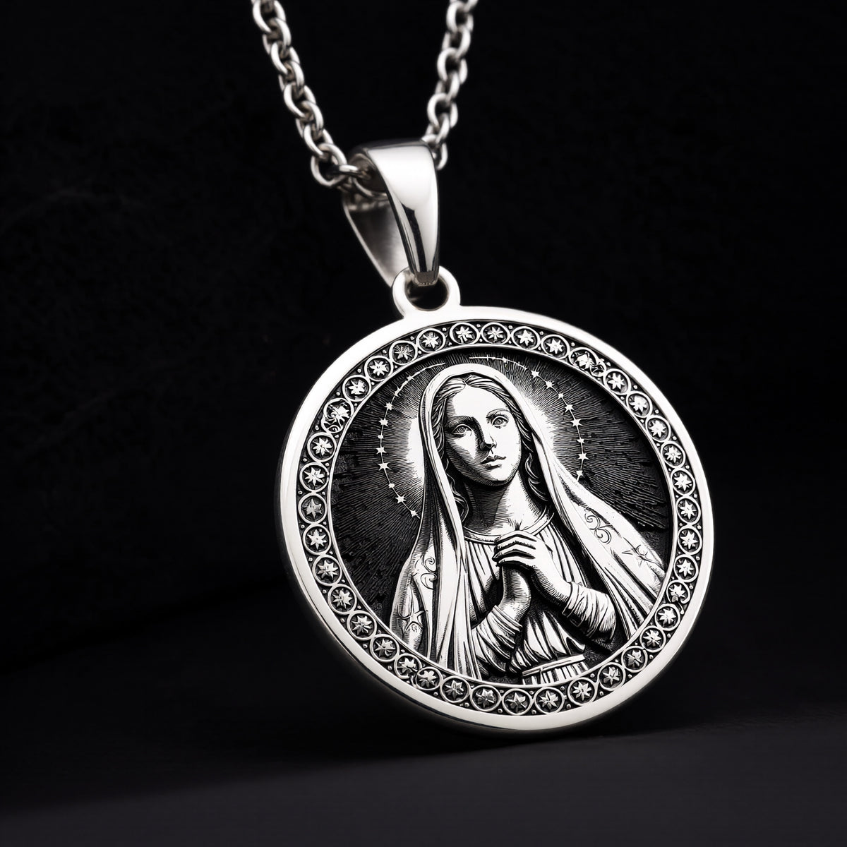925 Sterling silver Queen of Peace Virgin Mary medallion, featuring radiant halo details. A peaceful and timeless Catholic faith charm.