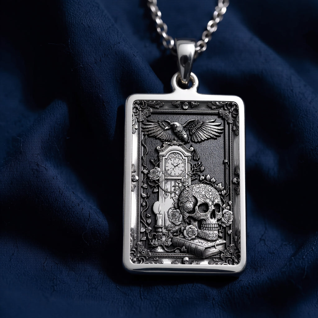 Silver skull tarot pendant with gothic style design, shown in a flat lay view. The image also includes size and chain length charts for reference.