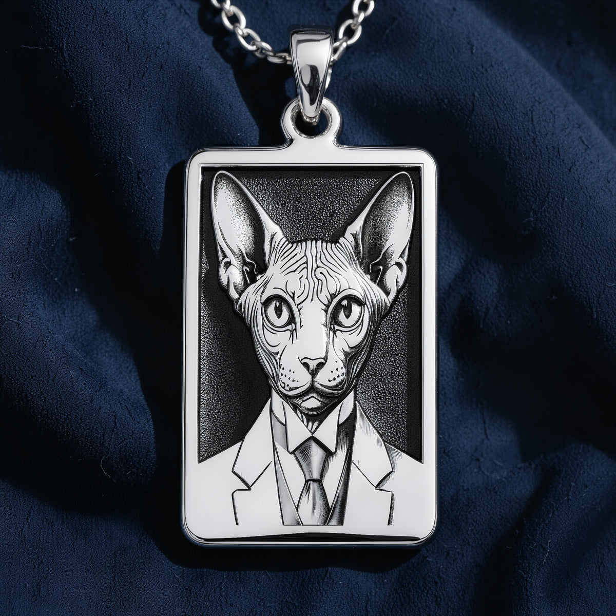 Angled perspective of 925 Sterling Silver Dapper Sphynx Cat Man Portrait Rectangle Pendant Necklace, showcasing textured border craftsmanship in solid hypoallergenic 925 sterling silver.
