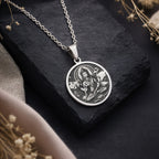 Green Tara Varada Mudra Amulet Necklace Necklaces 925 925 Sterling Silver pendant necklace featuring a classical figure design on a round disc.