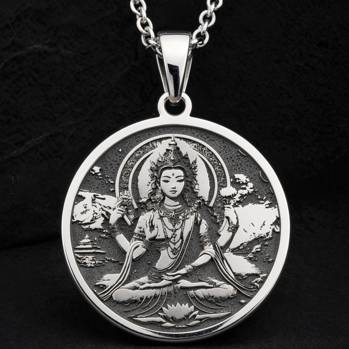 Green Tara Varada Mudra Amulet Necklace Necklaces 925 925 Sterling Silver round pendant featuring a seated deity figure with a halo on a black background.