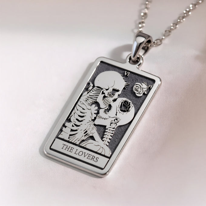 Silver plated Lovers Tarot card pendant necklace. Occult astrology zodiac symbol jewelry with a polished finish.
