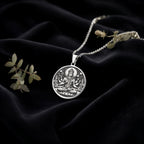 Sterling silver Vishnu Conch Disc Amulet Necklace: round  of Hindu deity Vishnu with en...