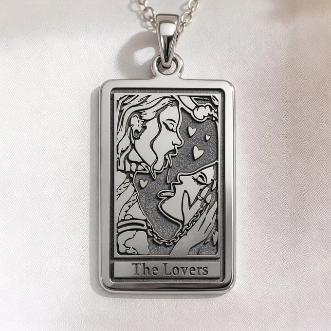 Lovers Tarot Card Necklace pendant in silver or gold plated finish. Occult Arcana talisman for tarot enthusiasts. Polished metal jewelry.