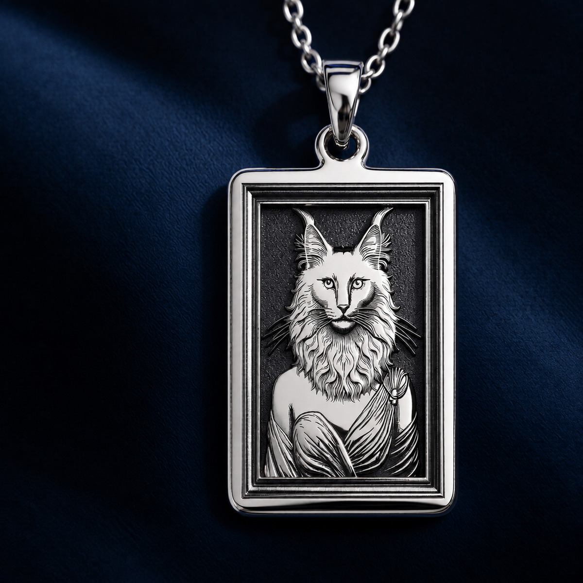 A handcrafted 925 sterling silver Ankara cat charm in a rectangular shape. This personalized piece of anthropomorphic jewelry is a standout accessory for any cat lover.