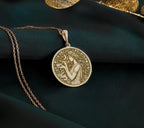 Hygieia Goddess Necklace Necklaces 14K 14K Gold Plated circular pendant featuring a classical female figure and floral wreath design.