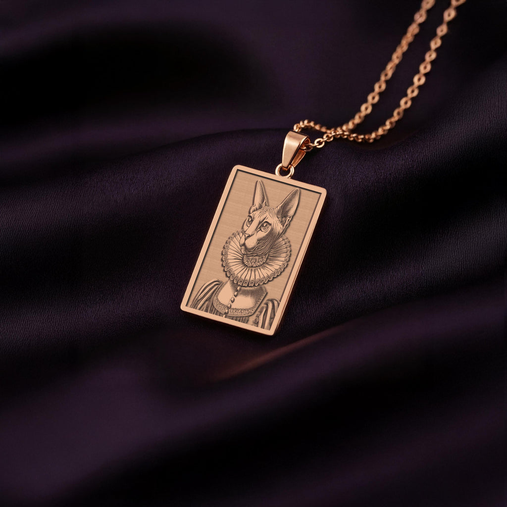 Personalized rose gold plated pet portrait necklace. The pendant shows a Sphynx cat dressed as a noble lady, created with precision laser engraving.