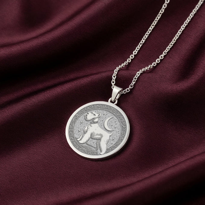 925 Sterling Silver Schnauzer medallion with a beautifully detailed engraving of the dog's side profile. This custom pet portrait pendant features the classic bearded silhouette and a decorative border. Timeless jewelry for a Schnauzer owner.