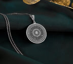 Sterling silver sun pendant necklace with intricate sunburst design, ideal as a gift for spiritual souls and celestial jewelry collectors.