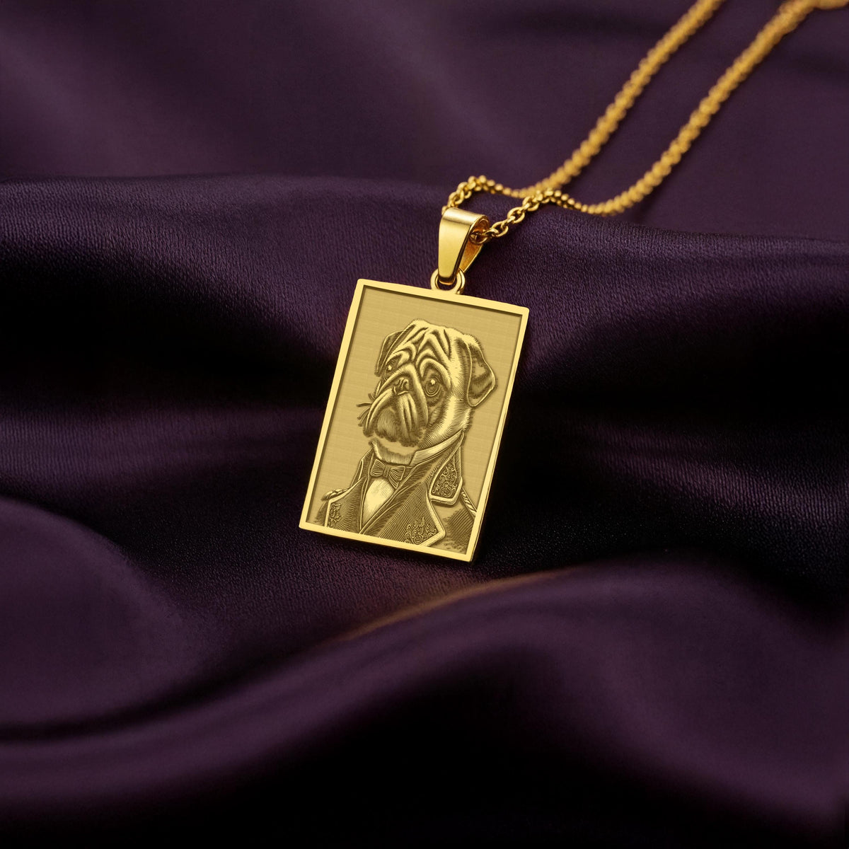Close-up of a custom engraved 14K gold plated necklace showing an anthropomorphic Pug portrait, a perfect quirky gift for a Pug dad.