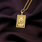 14K Solid Gold Turkish Angora necklace from The Ancestors Collection, featuring an engraved portrait of a dapper cat in a vintage suit on a dark purple background.